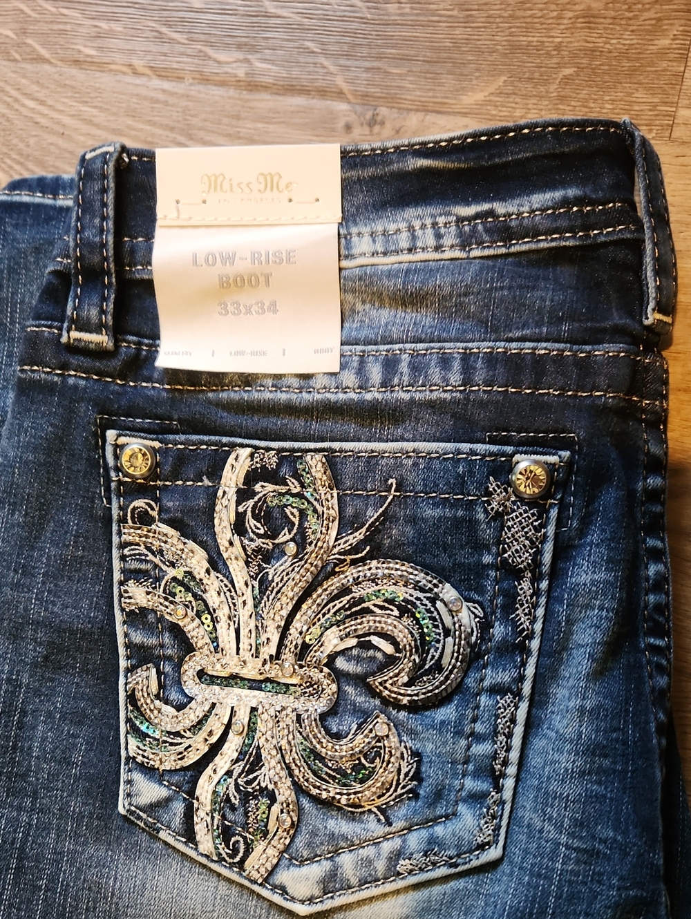Miss Me Dark Blue Bootcut Jeans with Embroidered Sequin Fleur-de-Lis Pocket